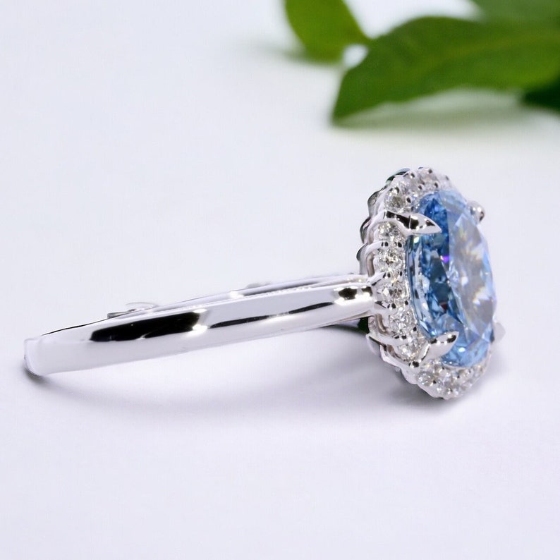 1.94 Carat Oval Fancy Vivid Blue Diamond, Rare Color, Diamond Halo Setting,18k White Gold Anniversary Ring, IGI Certified Rings In Stock image 6