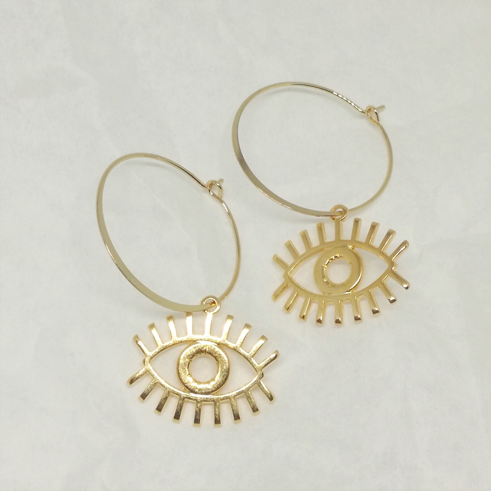 Evil earrings Clearance