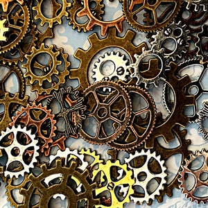 May include: A collection of antique-style metal gears in various sizes and shapes, with a mix of gold, silver, and bronze tones. The gears are arranged in a random pattern, creating a visually interesting and intricate design.