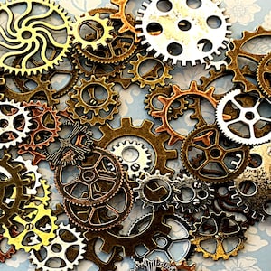 May include: A collection of antique-looking metal gears in various sizes and shapes, with a swirling pattern on the largest gear. The gears are arranged in a random pattern on a floral background.