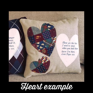 May include: A beige square pillow with two patchwork hearts and a white heart-shaped applique. The larger heart is made of various patterned fabrics. Text on the pillow reads, "These are the ties I used to wear...Love Papa xxx."
