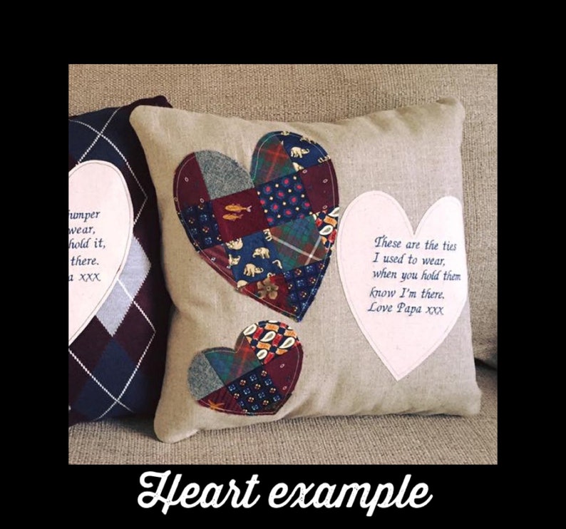 May include: A beige square pillow with two patchwork hearts and a white heart-shaped applique. The larger heart is made of various patterned fabrics. Text on the pillow reads, "These are the ties I used to wear...Love Papa xxx."