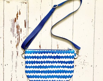 Blue wave pattern cross body bag with adjustable strap