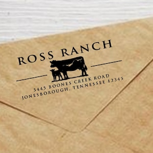 May include: A brown envelope with a black stamp that reads "ROSS RANCH" above a cow and calf graphic. Below the graphic is the address "5445 BOONES CREEK ROAD JONESBOROUGH, TENNESSEE 32345".
