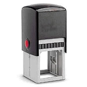 May include: Black self-inking stamp with a red button. The stamp has a rectangular frame and a clear window for the impression.