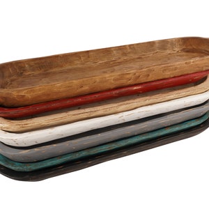 May include: A stack of six wooden dough bowls in various colors, including natural wood, red, cream, white, gray, and teal.