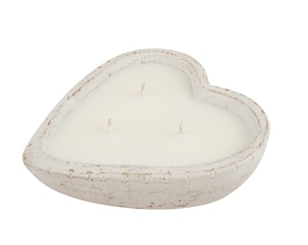 May include: White heart-shaped candle with three wicks in a white ceramic holder.