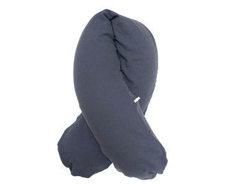 May include: A dark blue, U-shaped pregnancy pillow made of soft, textured fabric. The pillow is designed to provide support and comfort during pregnancy.