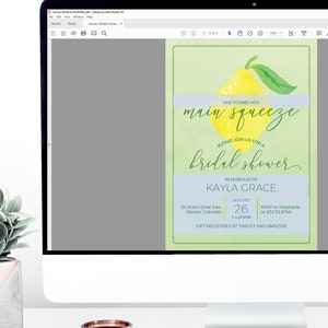 May include: A digital invitation for a bridal shower with a lemon illustration and the text "She found her main squeeze. Please join us for a bridal shower in honor of Kayla Grace. August 26, 1-4:00 PM, 35 Acton Drive East, Denver, Colorado. RSVP to Stephanie at 632.112.8749. Gift registries at Target and Amazon."
