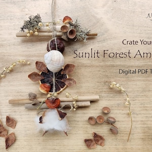 May include: A handcrafted forest amulet featuring a seashell, dried orange slice, and acorns. The text "Crate Your Own Sunlit Forest Amulet" and "Digital PDF Tutorial" are displayed on a wooden background. Natural craft project.