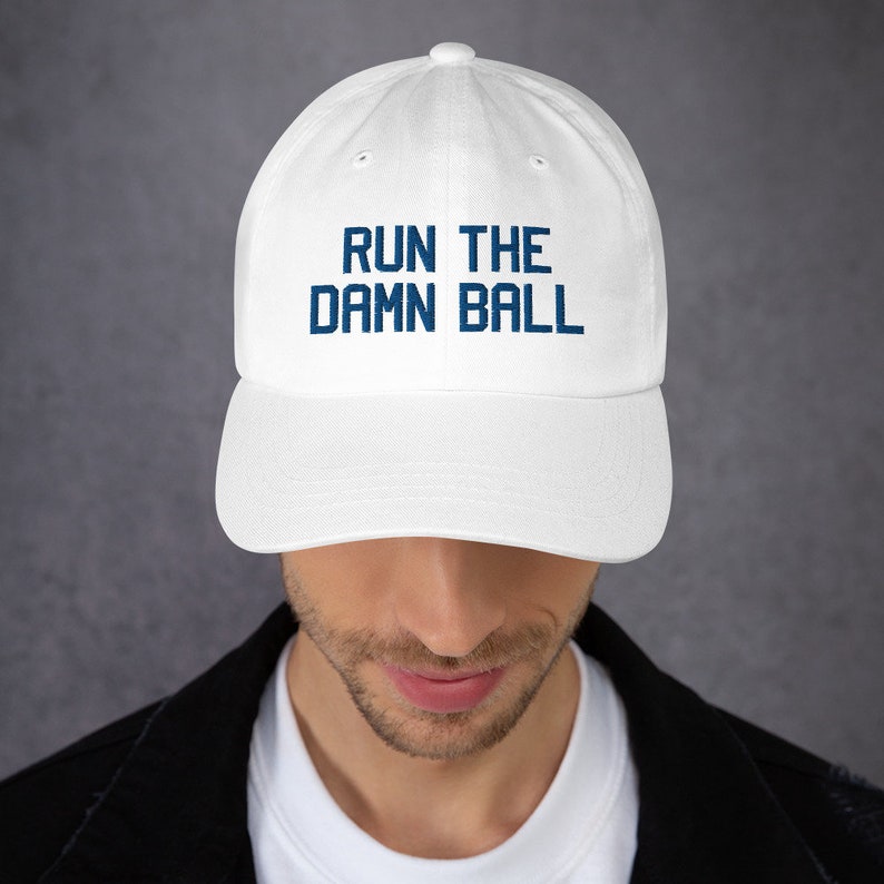 Run the damn ball hat Indianapolis Colts fan hat Quarterback Jacoby Brissett hat white color front view men model