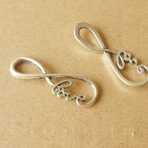 20 ST 13 x 38 mm Antiksilvertonat Oändligt hänge, KÄRLEKSordet Oändligt Berlock, Antiksilver Kontakthänge ABZ017B