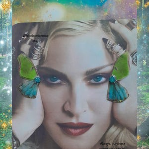 May include: A trio of ceramic mugs with a speckled, matte finish in cream, light grey, and dark grey. Each mug features a simple, minimalist design, ideal for tea or coffee.