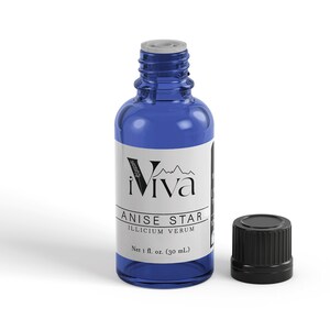 May include: A blue glass bottle with a white label that says "iViva ANISE STAR ILLICIUM VERUM Net 1 fl. oz. (30 ml)". The bottle has a black cap.