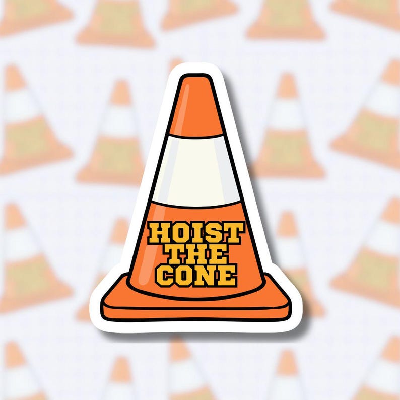 May include: Orange traffic cone sticker with the text "HOIST THE CONE" in a bold, yellow font. The cone has a white stripe and a black outline. The sticker is on a white background with a pattern of blurred orange cones.
