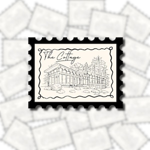 May include: Black and white illustration of a modern cottage on a postage stamp. The cottage features large windows, a sloped roof, and is surrounded by trees and rocks. The text "The Cottage" is above the cottage.