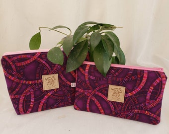 Matching pouches - purple and pink circular design. Two styles - stand-up & clutch style.  Makeup bag and/or organization/utility pouches