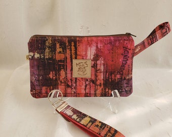 Wristlet/key fob set, "Hotel Burgundy", in burgundy, coral and black, distressed rust lining. Wristlet measures 8.5+"x 5", 2 inside pockets