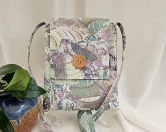 Crossbody bag. A "Nurtured Garden" of calming, soft, muted greens, mauves, and yellows by fabric designer Denise Burkitt