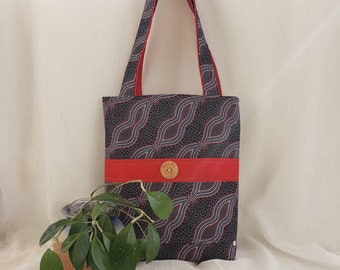 Mid-sized shoulder tote, an Australian Aboriginal Art design in vibrant black and red (detailed features and measurements below)