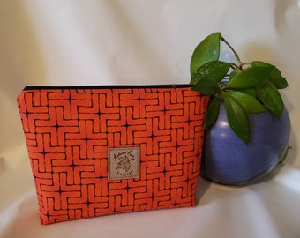 Medium zippered flat-bottom pouch - orange & navy. Makeup bag or organization/utility pouch.