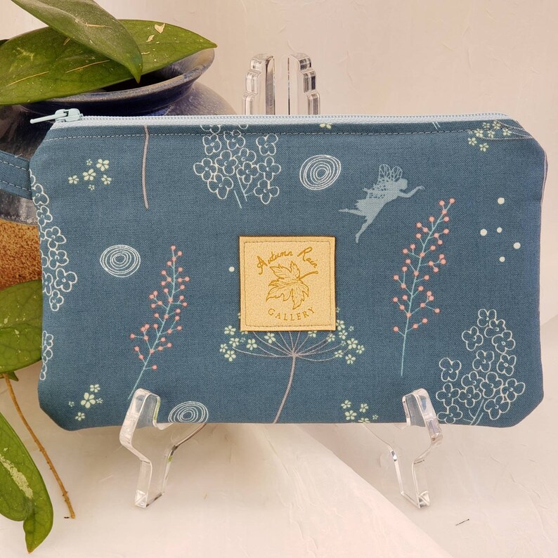 Zippered 8 x 5 clutchwristlet licensecredit cardscash etc fits newer 9+ phones Riley Blake Fairy Edith Wildflowers with mint lining