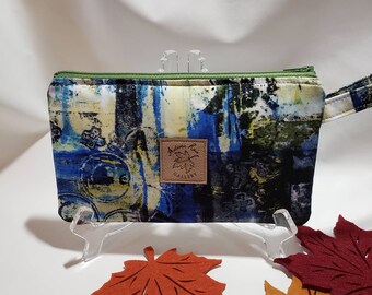 Zippered wristlet, Splashes of blue and green with blue lining, 8.+" x 5" fits 9+ phones, license/credit cards/cash, etc