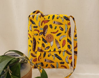 Crossbody cotton bag, Feather Toss on dark yellow. Part of the Birds of a Feather collection. See below for more details.