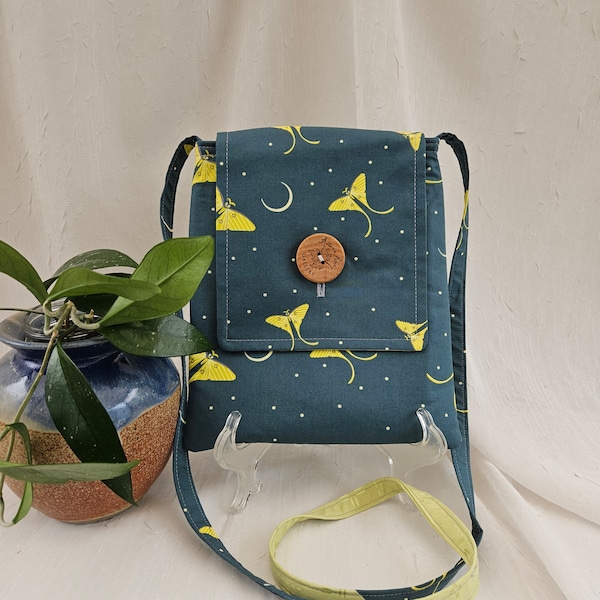 Crossbody bag. Designer Charlie Harper's Moth Flight in a dark khaki green with neon green accents & lining. For item specifics see below