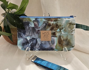 Wristlet/keyfob set, Hand-dyed fabric with unique color movement of blues/greens/ purples. Like cloud watching, do you see a purple orchid?