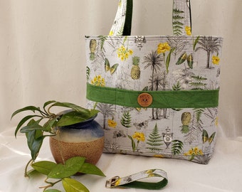 Reversible hand-made cotton tote, springtime green & yellow on lite grey, grass green reverse side, 6 pockets, 24" quilted straps