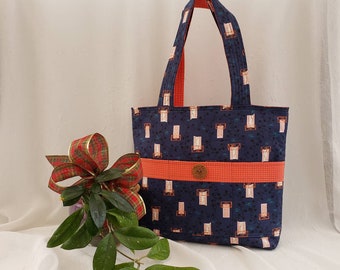 CLEARANCE Reversible cotton tote, gift for her, blue exterior with "Parisian" windows, orange interior, 6 Pockets, 23-inch quilted straps