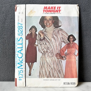 May include: Vintage McCall's 5287 sewing pattern for misses' dress or top. The pattern features illustrations of the finished garments in shades of red and peach. The package has the text "Make it Tonight" and lists the bust size as 34 inches.