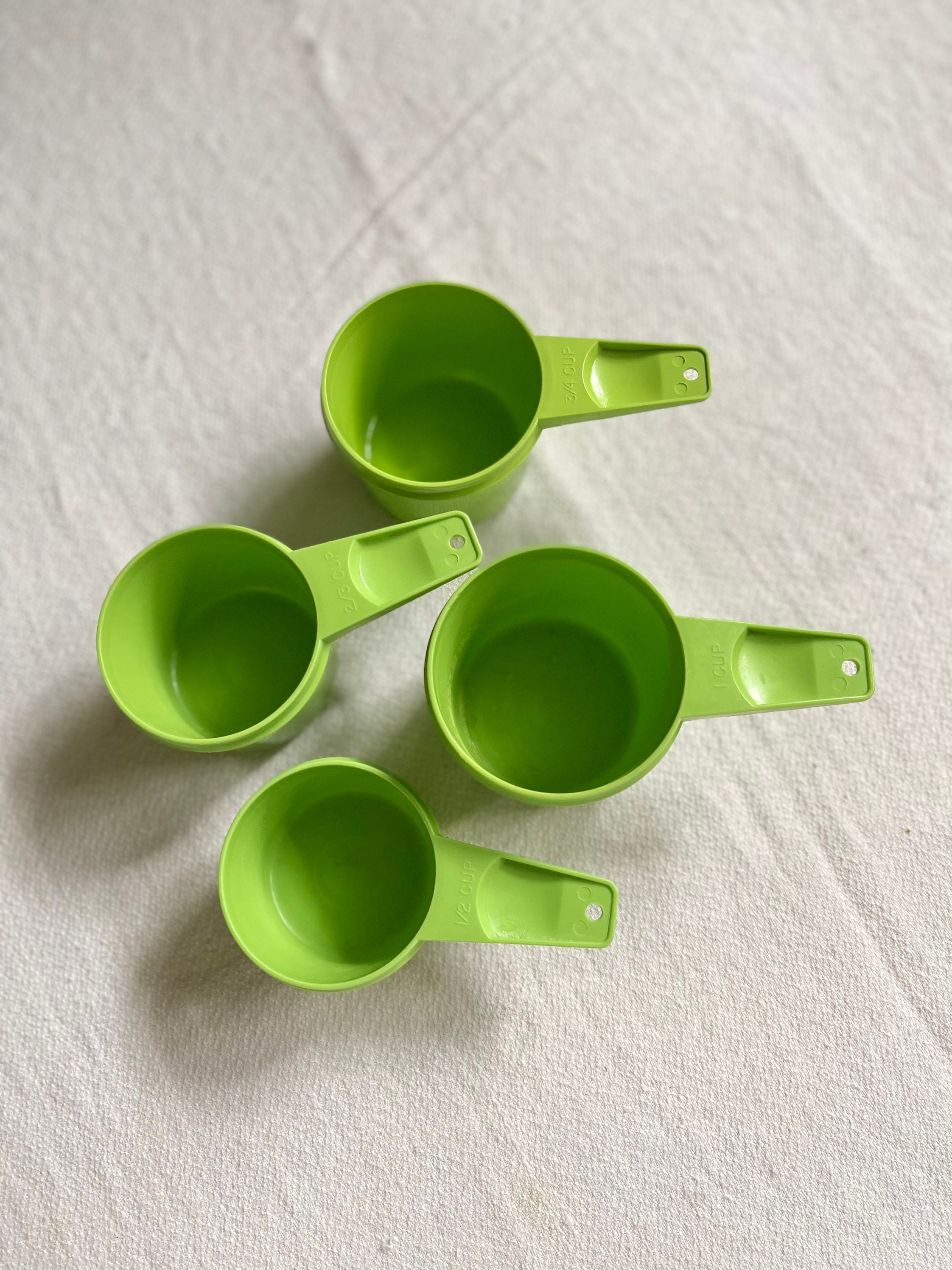 Four Vintage Tupperware Measuring Cups in Green 