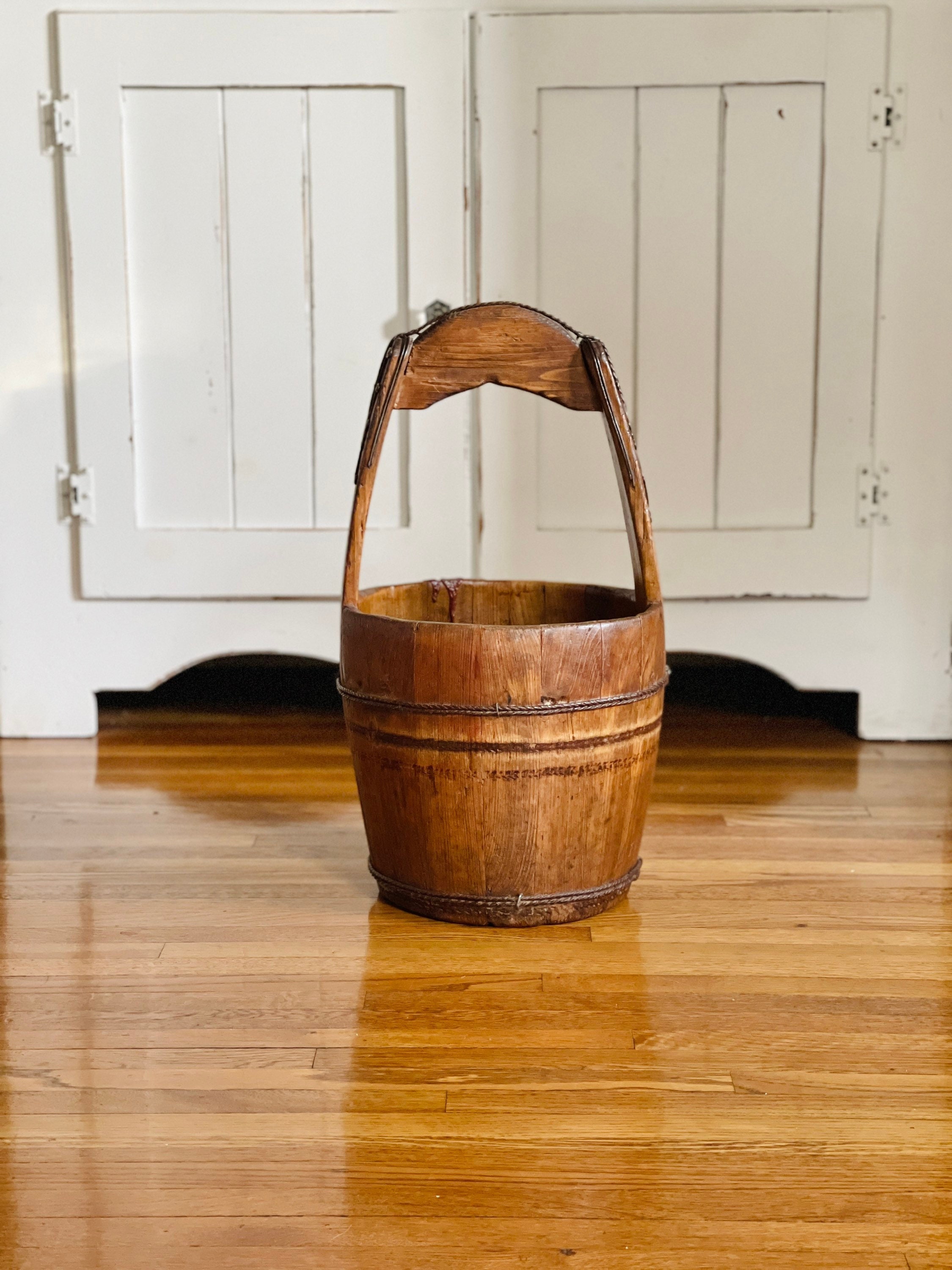 Vintage rustic wooden water bucket