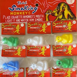 1 jouet vintage singe fumeur, bâillon fantaisie, cigarette de collection