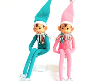 Elfos de Natal Retrô (conjunto de 2), Meias de Joelho Pixie Elfo em tons de azul-turquesa e rosa.