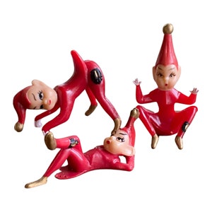 Pixie elf cake toppers, Red Christmas Elves (3), Playful pixies for holiday crafting, Santa’s helpers goof off
