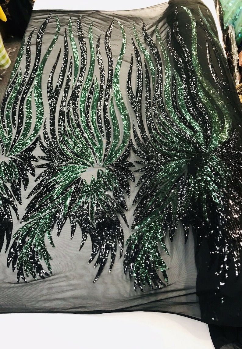 WHITE-BLACK ANGEL WINGS SEQUIN DESIGN ON A 4 WAY STRETCH MESH-BY YARD.
