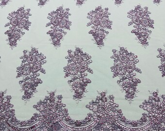 Lilac corded embroider with sequins on a mesh lace fabric-prom-sold by the yard.