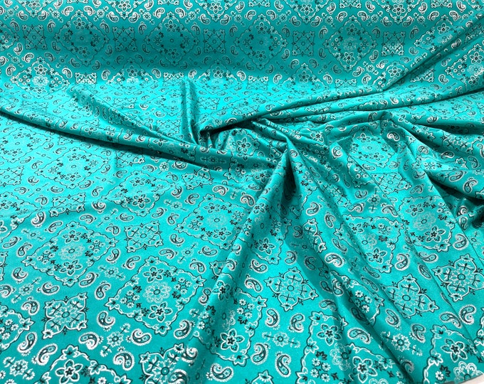 Jade metallic bandanna print on a stretch tricot spandex fabric- Sold by the yard.