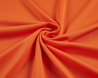 Orange 59/60" Wide 100% Polyester Wrinkle Free Stretch Double Knit Scuba Fabric Sold By The Yard.