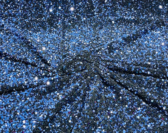 Navy blue 5mm sequins on a stretch velvet 2-way stretch, sold by the yard.