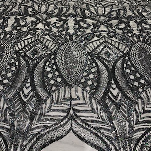 Black  iridescent royalty sequin design on a black 4 way stretch mesh-prom-sold by the yard.