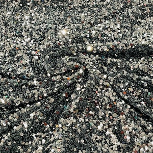 Silver 5mm sequins on a gray stretch velvet 2-way stretch, sold by the yard.