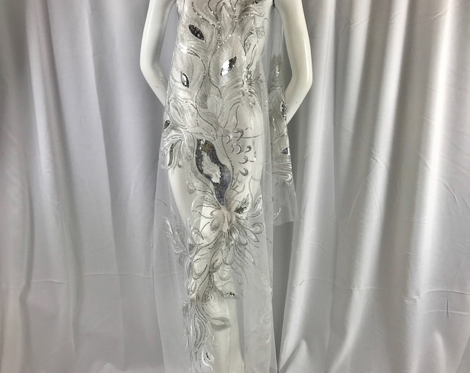 White peacock feathers embroider with shiny silver sequins on a white mesh-apparel-fashion-decorations-dresses-nightgown-sold by 2 panels.