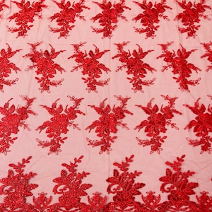 Red corded embroider with sequins on a mesh lace fabric-prom-sold by the yard.