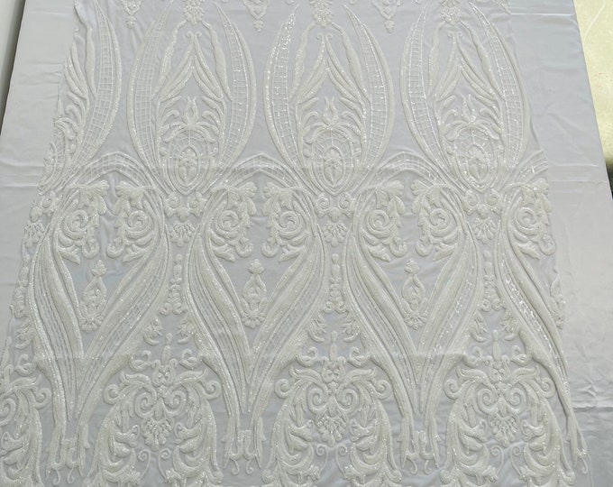 White empire damask design with sequins embroider on a 4 way stretch mesh fabric-sold by the yard.
