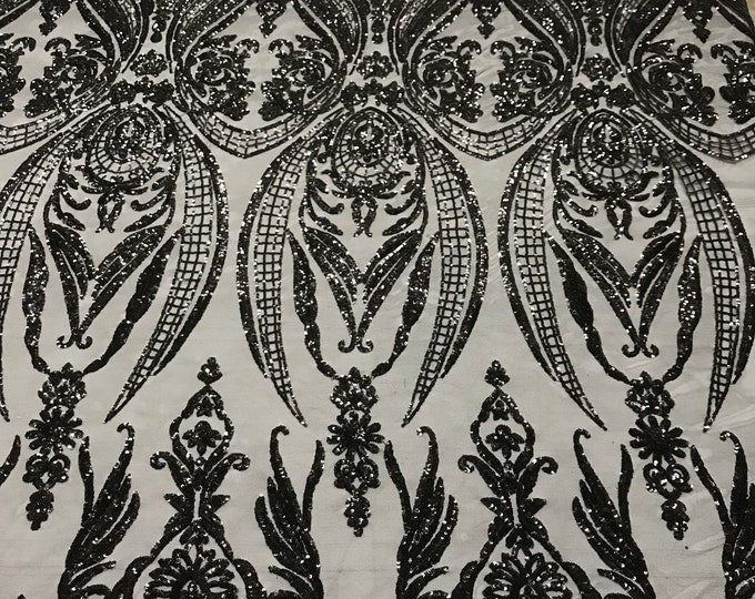 Black princess design embroidery with sequins on a 4 way Stretch Mesh-sold by the yard.