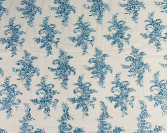 Light Blue Lex floral design corded and embroider with sequins on a mesh lace fabric-prom-sold by the yard.